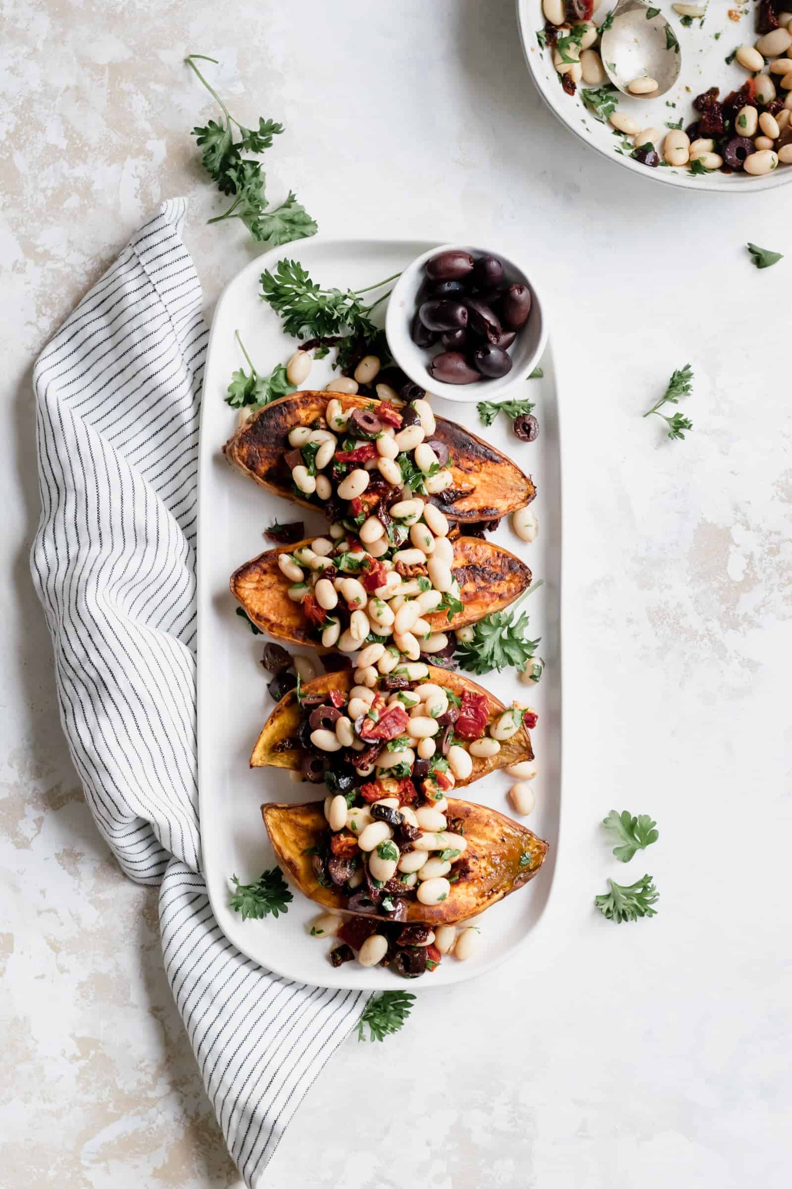 Mediterranean White Bean Stuffed Sweet Potatoes