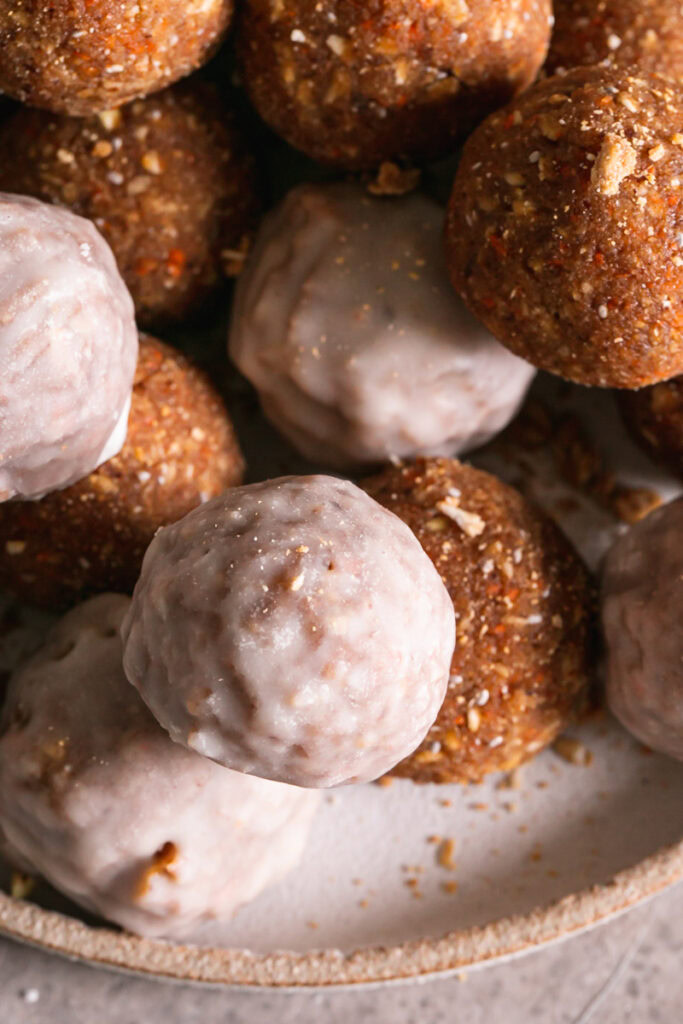 a close up of no-bake carrot cake granola bites