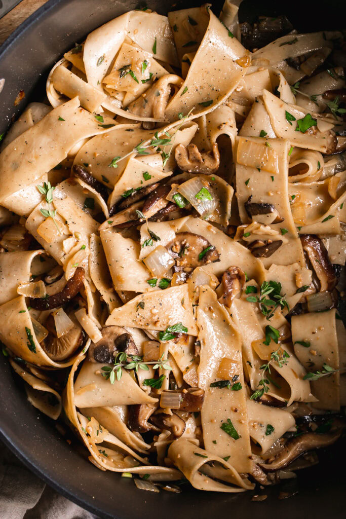 close up of gluten-free pappardelle with wild mushroom Ragù