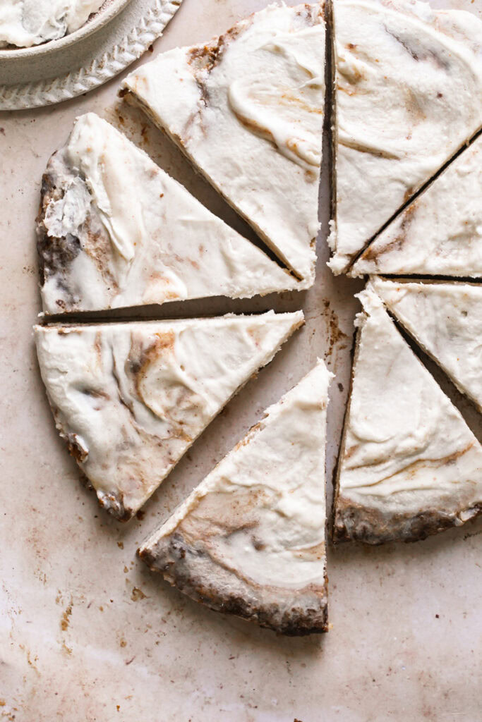 close up of the sliced cinnamon roll dessert pizza