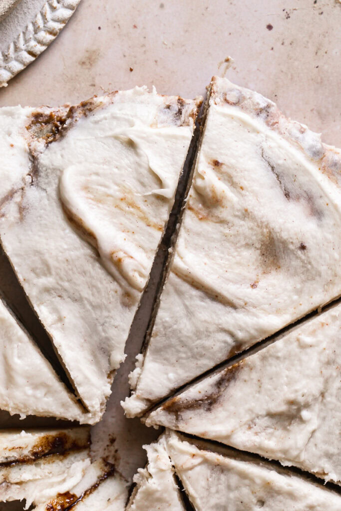 close up of the sliced cinnamon roll dessert pizza