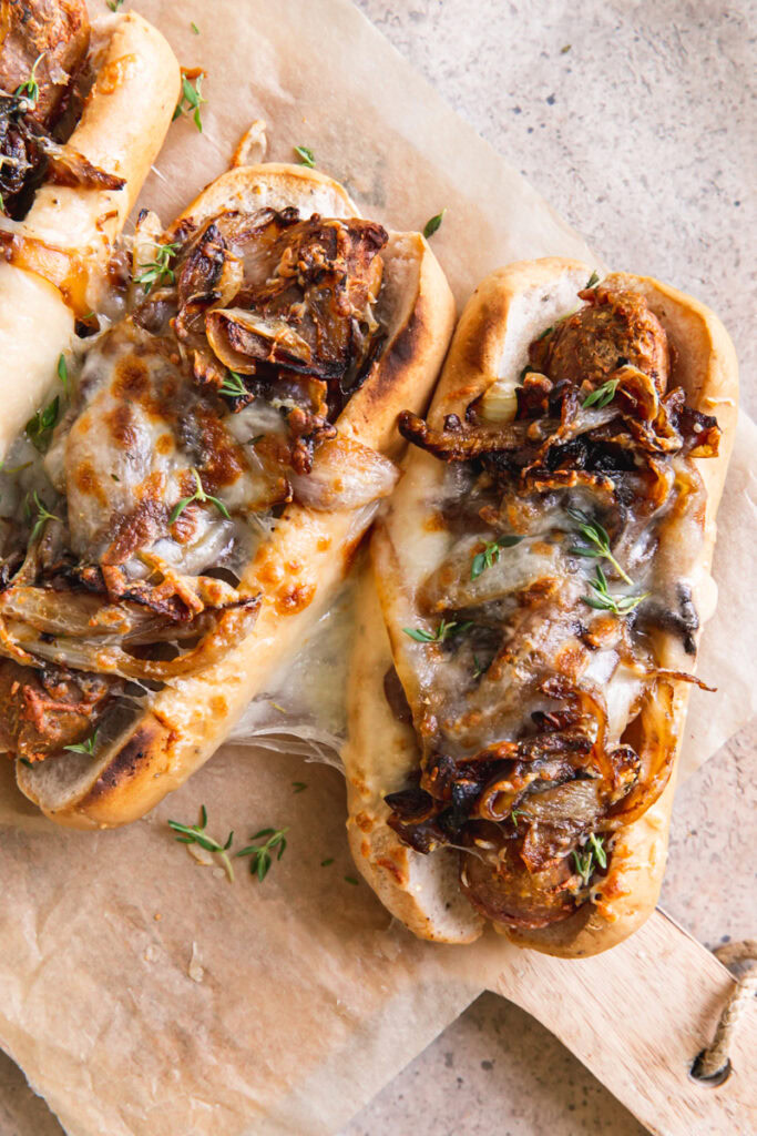 close up of vegan French onion brats