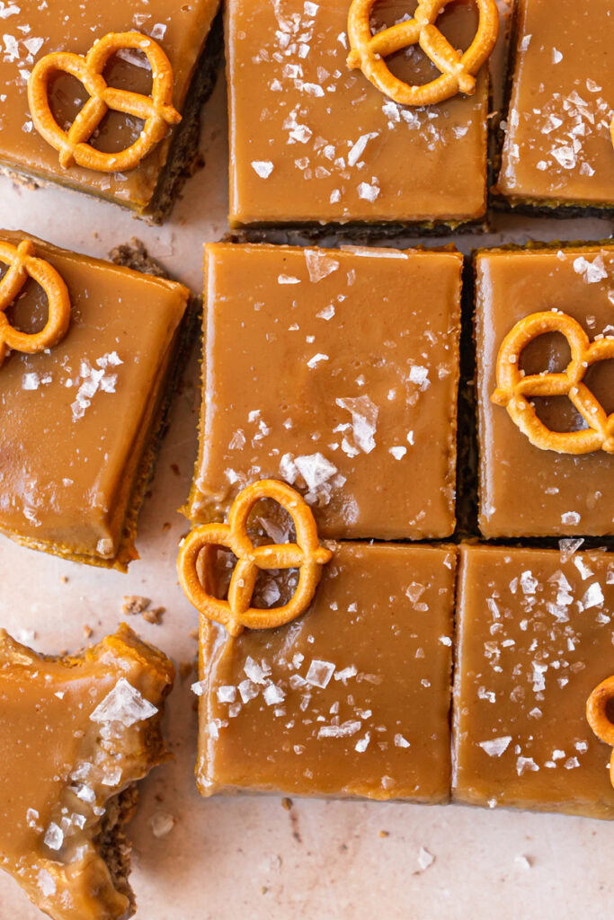 a close up overhead shot of sliced Salted Caramel Pumpkin Pie Bars