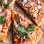 close up overhead shot of a slice of Vegan BBQ Chicken Pizza