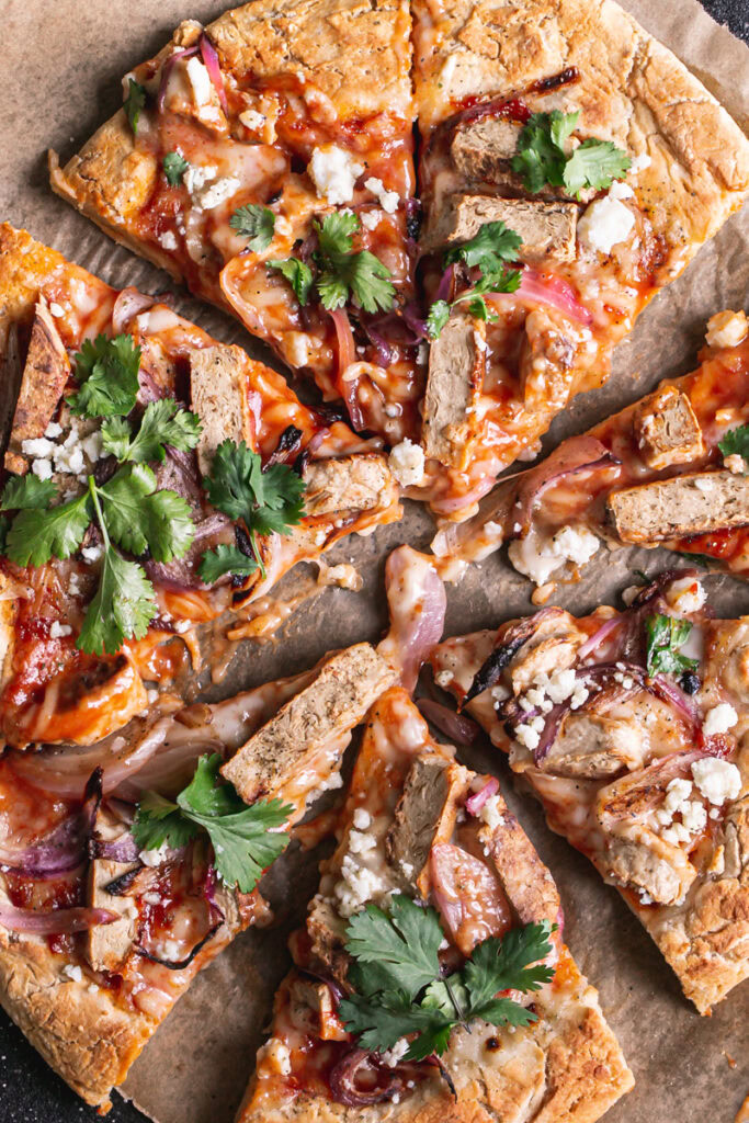 Vegan BBQ Chicken Pizza sliced into pieces