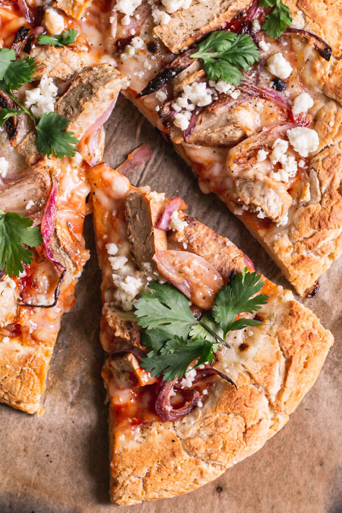 close up overhead shot of a slice of Vegan BBQ Chicken Pizza