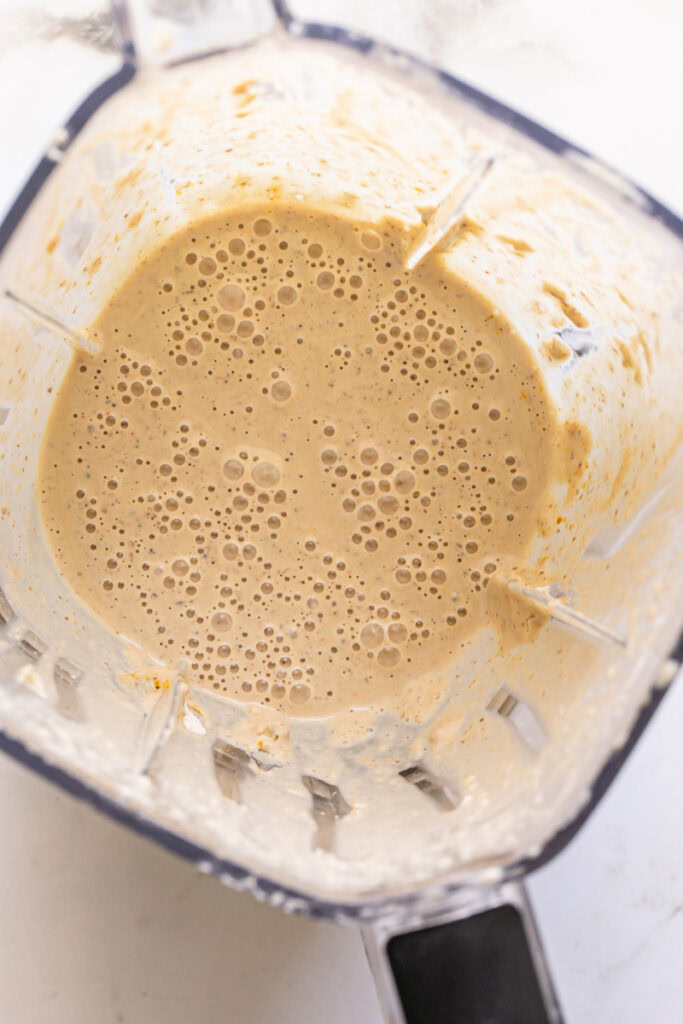 the batter blended in the blender container