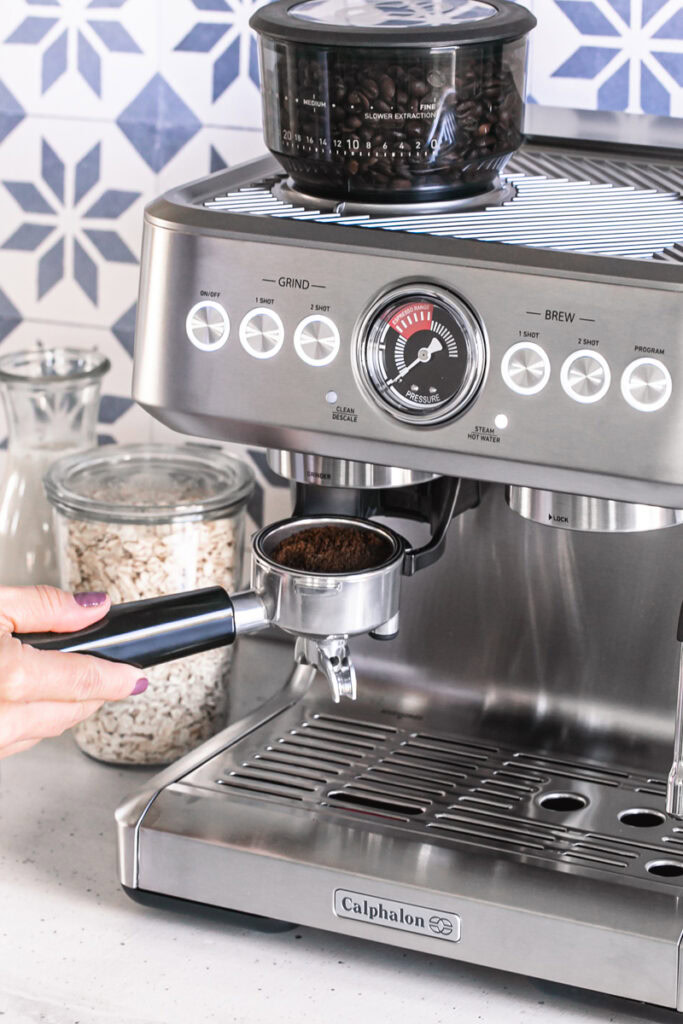 showing the ground coffee from the espresso machine
