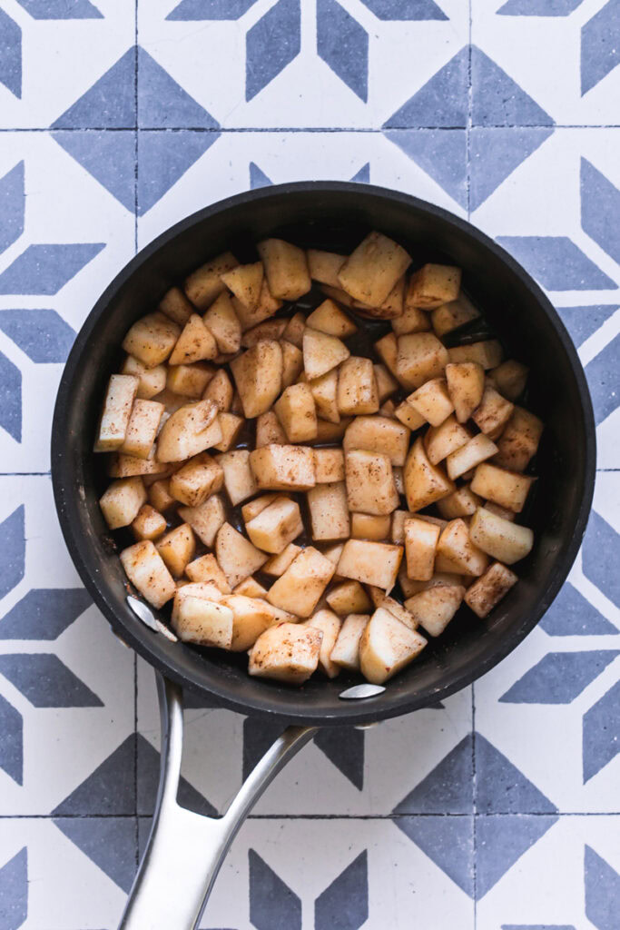 apples and spices in a saucepan