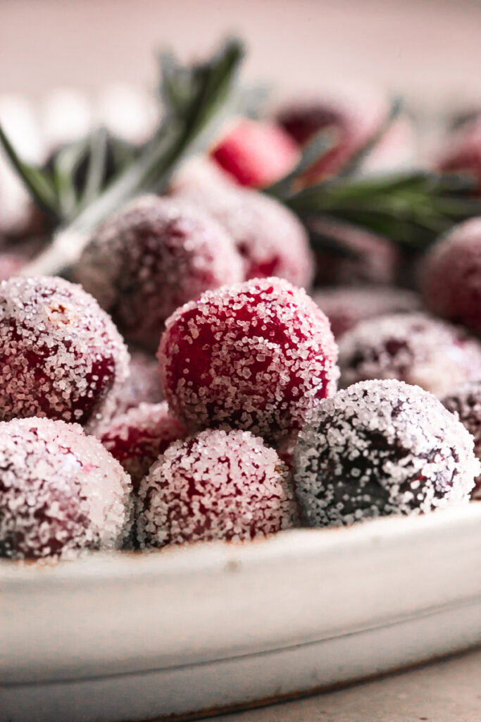 very close up of a few sugared cranberries