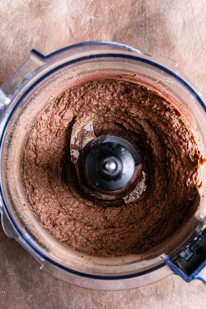 blended up frosting in a food processor