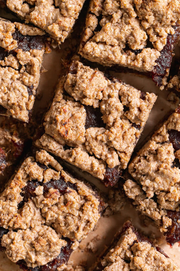 overhead shot of Peanut Butter Oat Date Crumb Bars cut into squares