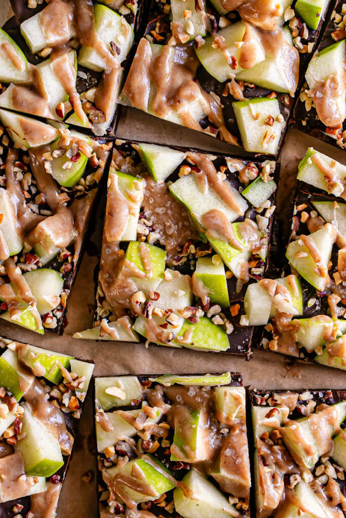 overhead shot of caramel apple date bark sliced into squares