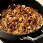a skillet of caramelized onions and garlic
