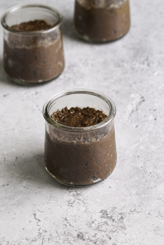 3 jars filled 3/4 with the chocolate chia seed pudding.