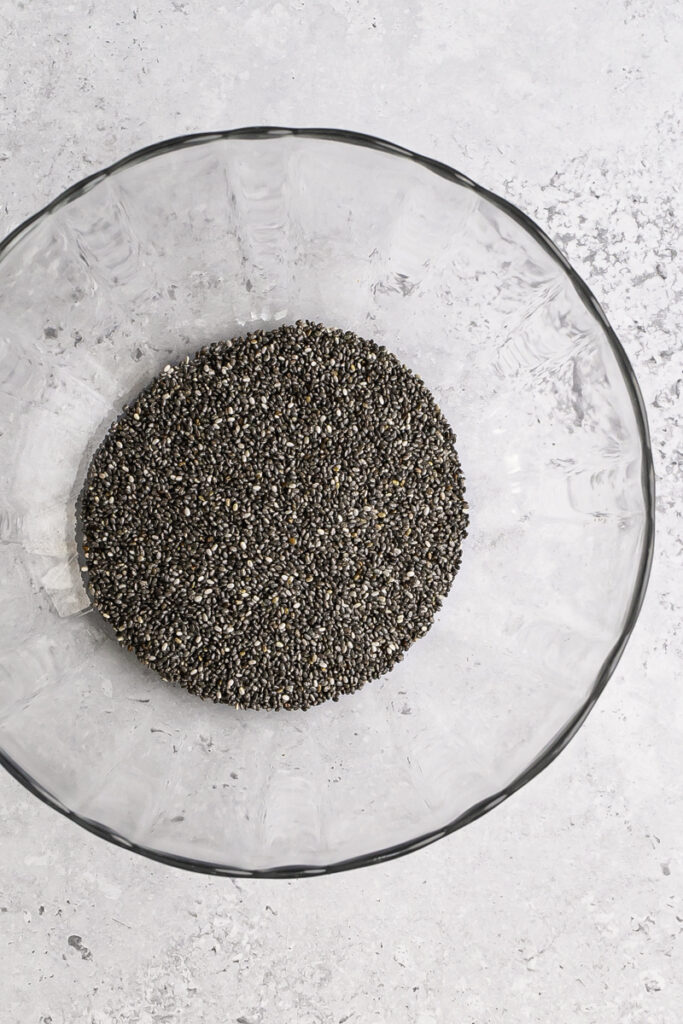 a glass bowl with chia seeds in it.