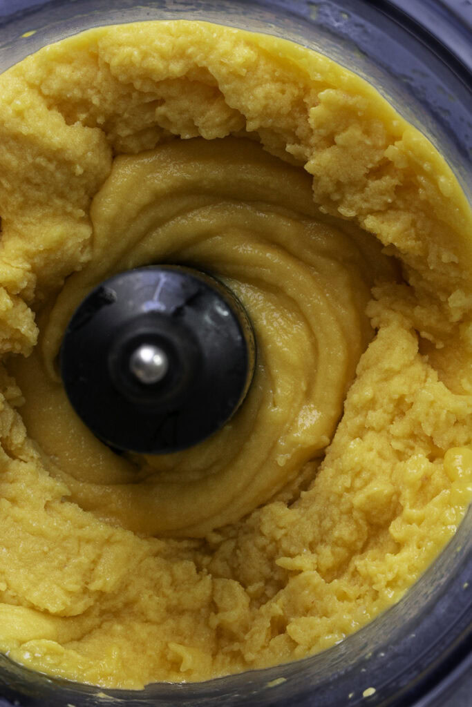 blended mango peach sorbet in a food processor.