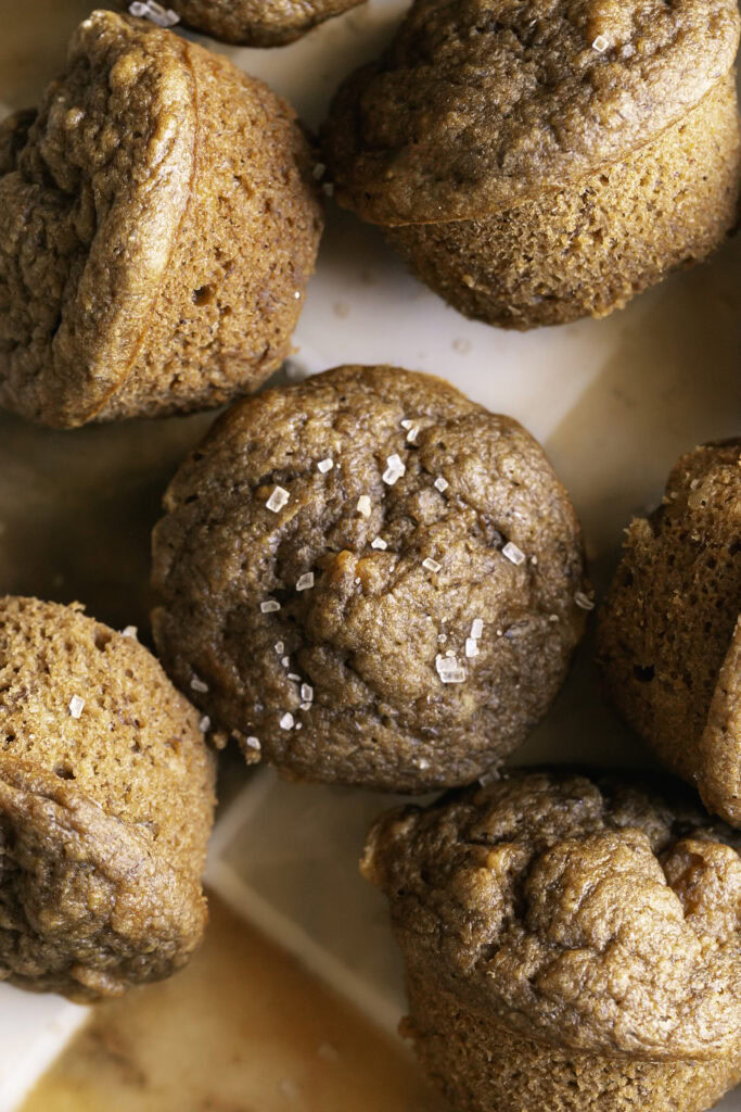close up overhead shot of mini apple cider banana bread muffins.