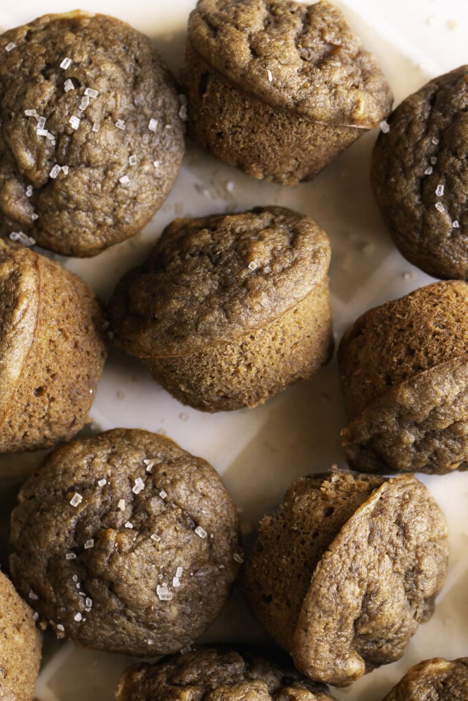 close up overhead shot of mini apple cider banana bread muffins.