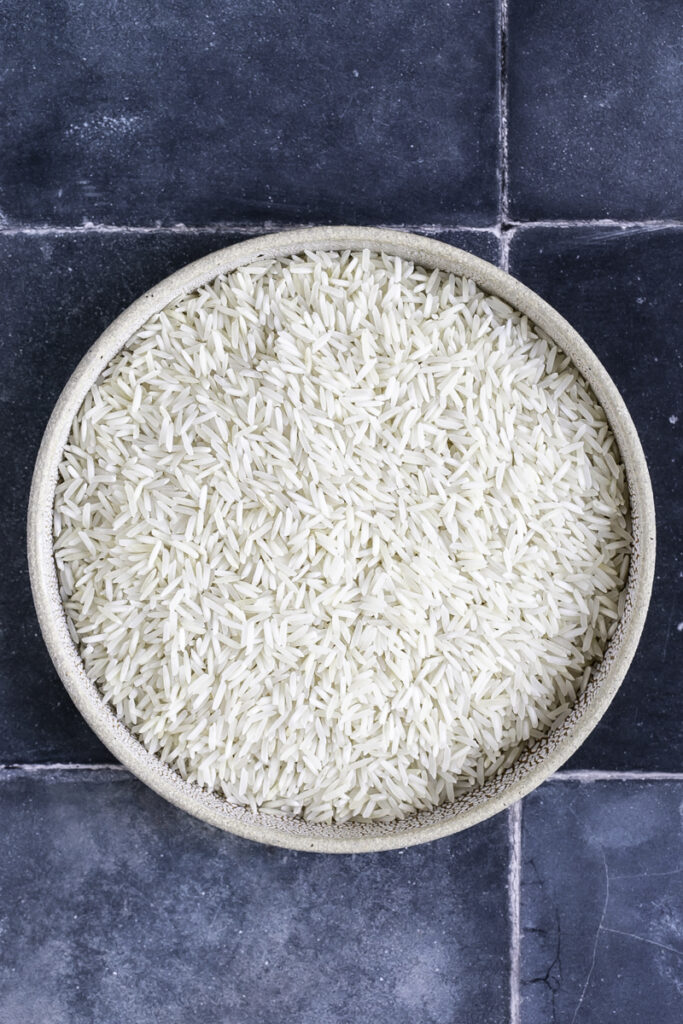 uncooked basmati rice in a bowl.
