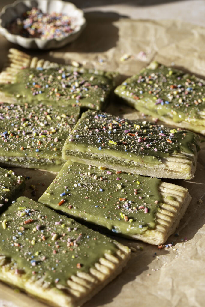 3/4 shot of sliced giant frosted matcha pop tart.