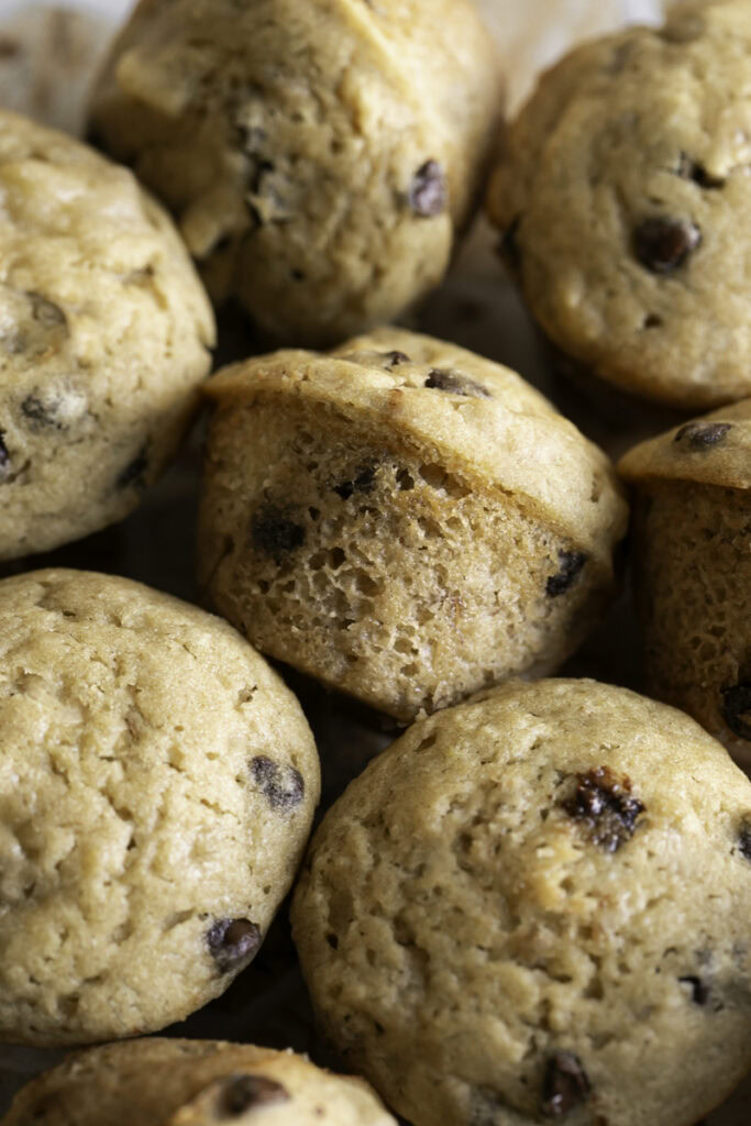 overhead shot of mini buckwheat flour chocolate chip banana muffins.