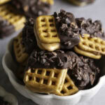 a bowl of Caramel Stuffed Chocolate Dipped Pretzels.