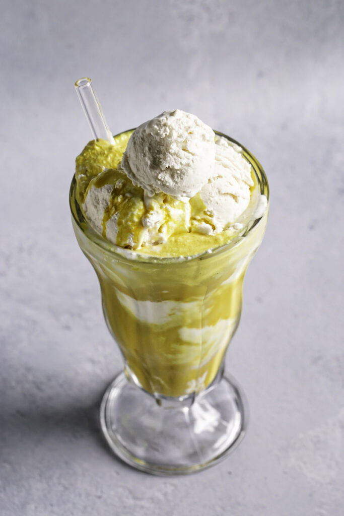 3/4 shot of golden milk ice cream float.