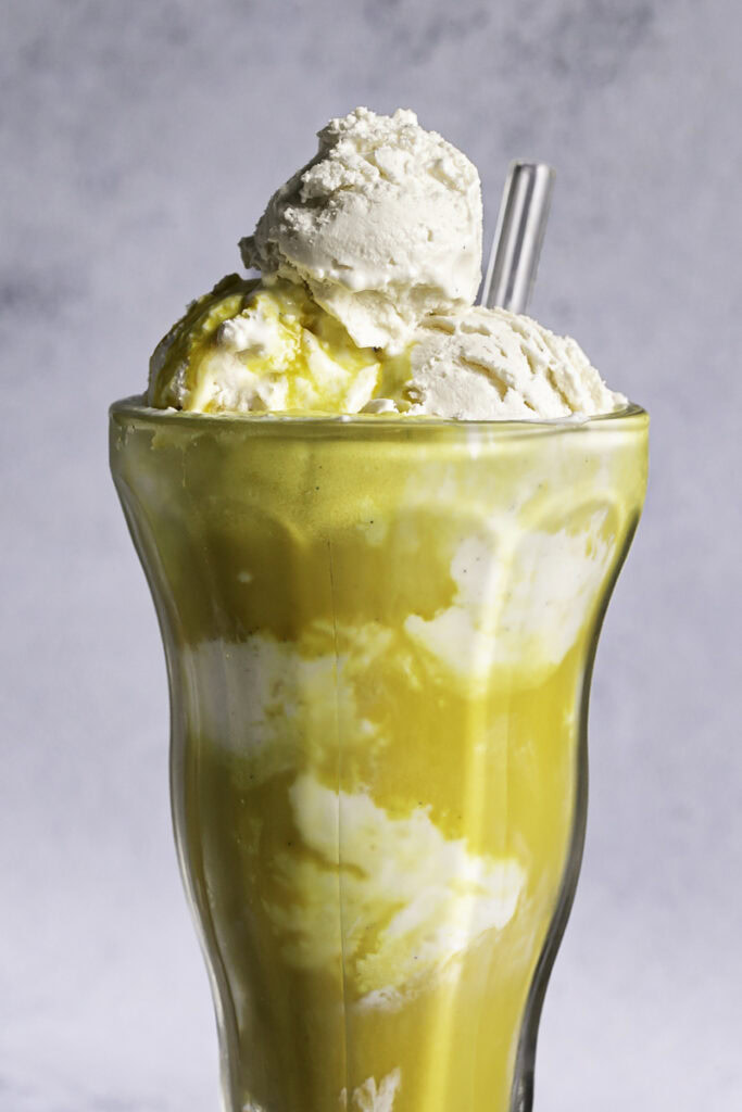 close up of golden milk ice cream float.