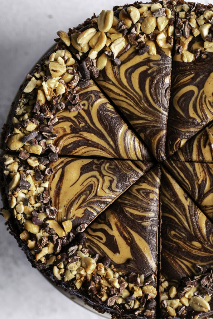overhead shot of the vegan triple chocolate peanut butter cheesecake marble topping.